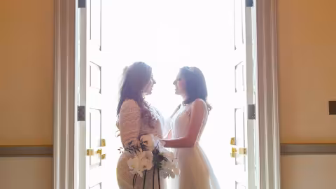 brides looking each other tenderly